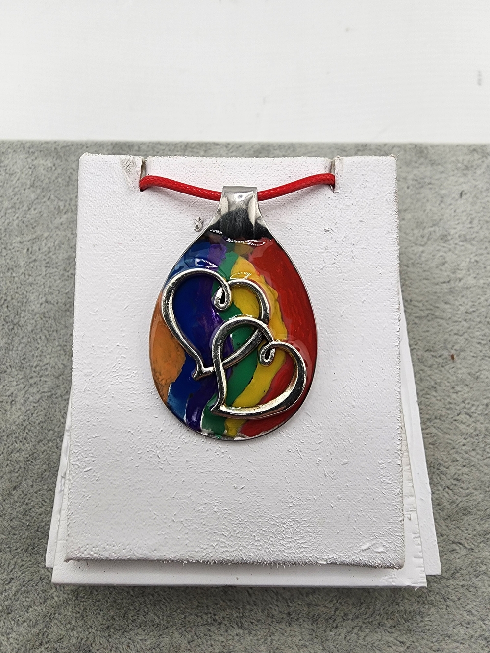Handmade Rainbow Love Spoon Pendant with two interlocking hearts